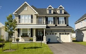 Beautiful house with green lawn and blue sky